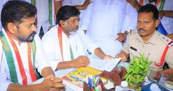 Telangana Congress president Revanth Reddy (extreme left) and Congress Legislature Party leader Mallu Bhatti Vikramarka submit their complaint at Moinabad police station | Twitter | @revanth_anumula