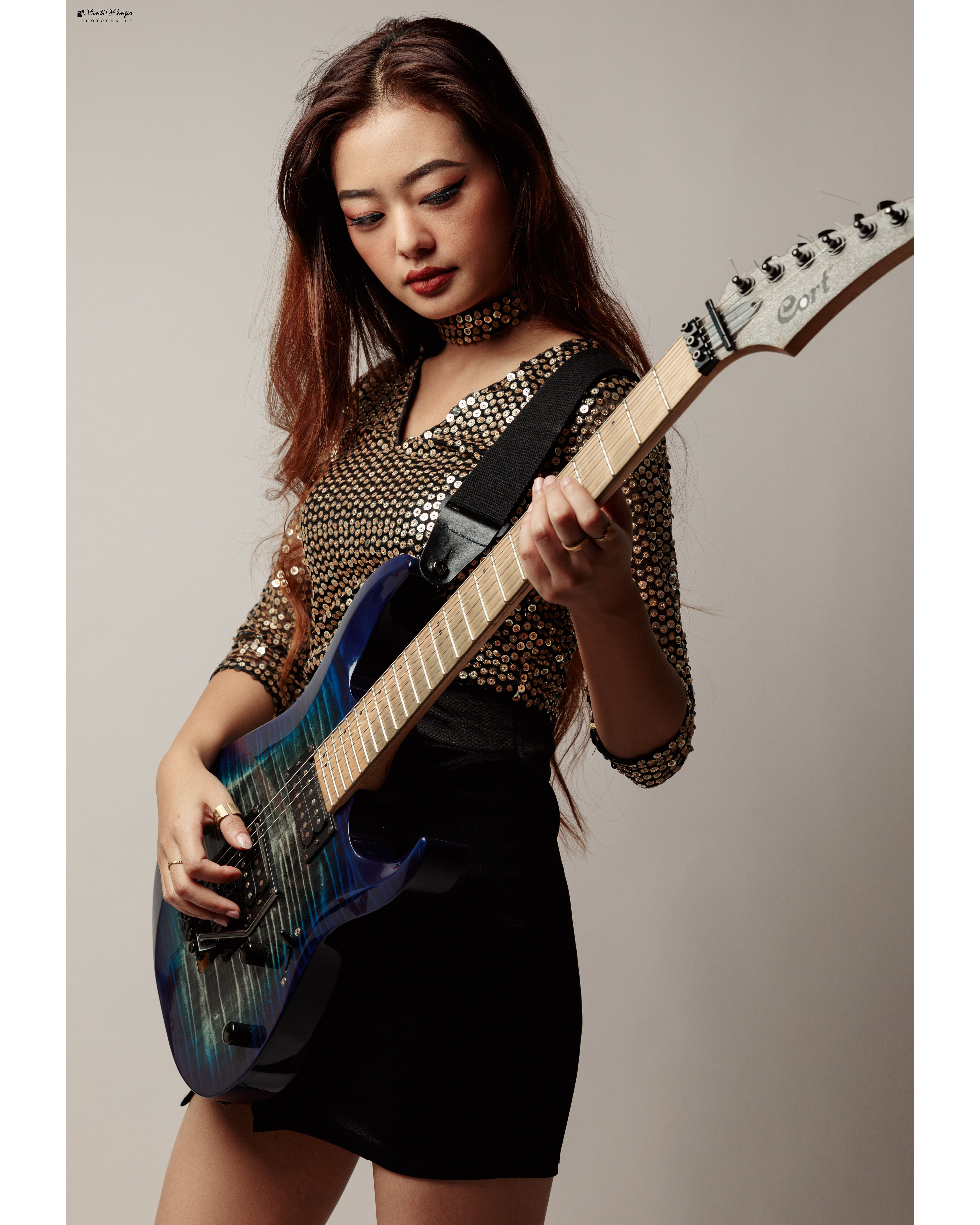 Jamir poses with her electric guitar | Photo by special arrangement