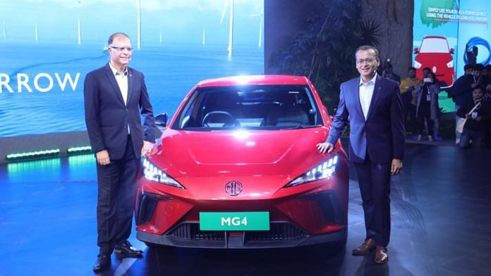 MG Motor India MD Rajeev Chaba (L) and chief commercial officer Gaurav Gupta (R) unveiling MG4 EV | Yuthika Bhargava | ThePrint