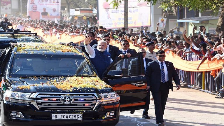 Modi’s security breached as boy jumps barricades to garland him in Karnataka’s Hubballi