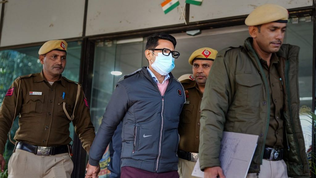 Shankar Mishra being taken away by the police from the DCP office at IGI Airport in New Delhi, on 7 January 2023 | PTI
