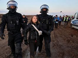 Police officers detain climate activist Greta Thunberg on the day of a protest against the expansion of the Garzweiler open-cast lignite mine of Germany's utility RWE to Luetzerath, in Germany, 17 January, 2023 | Reuters