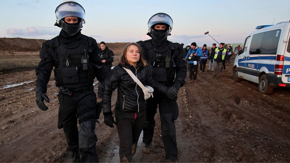 Police officers detain climate activist Greta Thunberg on the day of a protest against the expansion of the Garzweiler open-cast lignite mine of Germany's utility RWE to Luetzerath, in Germany, 17 January, 2023 | Reuters