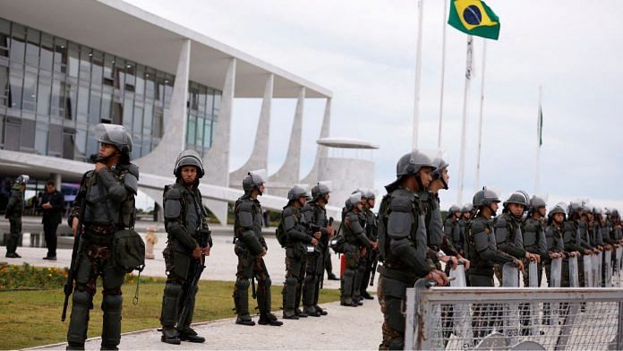 File photo of army officers standing guard outside the Planalto Palace, in Brasilia, Brazil on 11 January, 2023 | Reuters