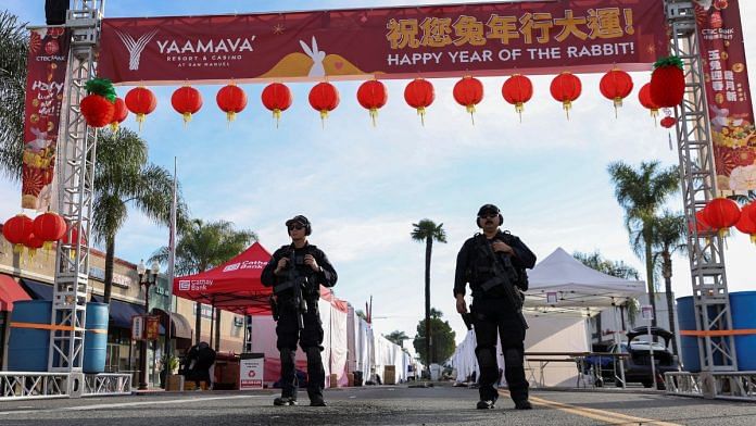 Police officers guard the area near the location of a shooting that took place during a Chinese Lunar New Year celebration, in Monterey Park, California, US on Sunday | Reuters