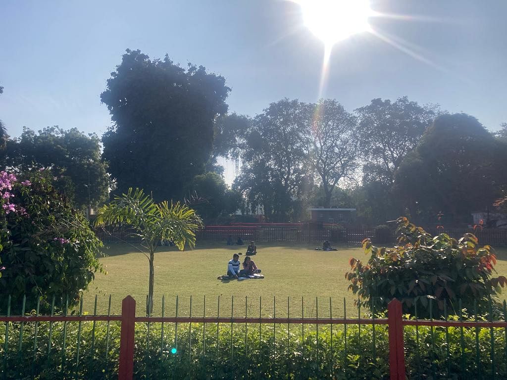 A couple relaxes at the Chandrashekhar azad Park in Prayagraj | Vandana Menon, ThePrint