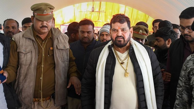 WFI chief Brij Bhushan Sharan Singh arrives to speak with the media regarding recent allegations of sexual harassment against him, in Gonda district, on 20 January 2023 | PTI
