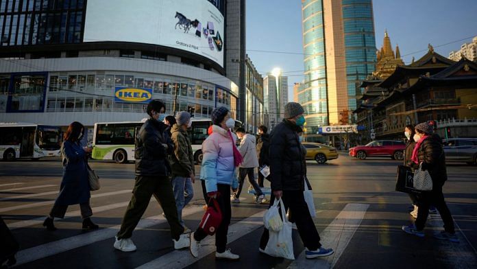 People in Shanghai on 3 January as China's Covid outbreak continues | Reuters