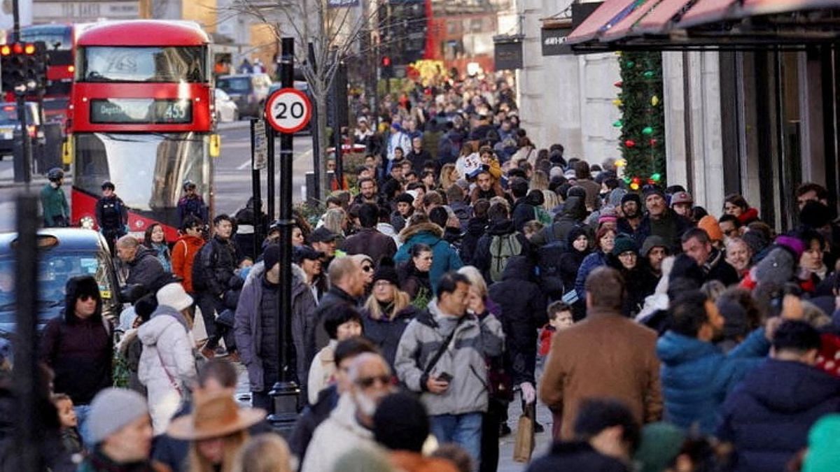 File photo of people walking along a busy shopping street, during the traditional Boxing Day sales in London, Britain, 26 December 2022 | Reuters/Maja Smiejkowska/File Photo