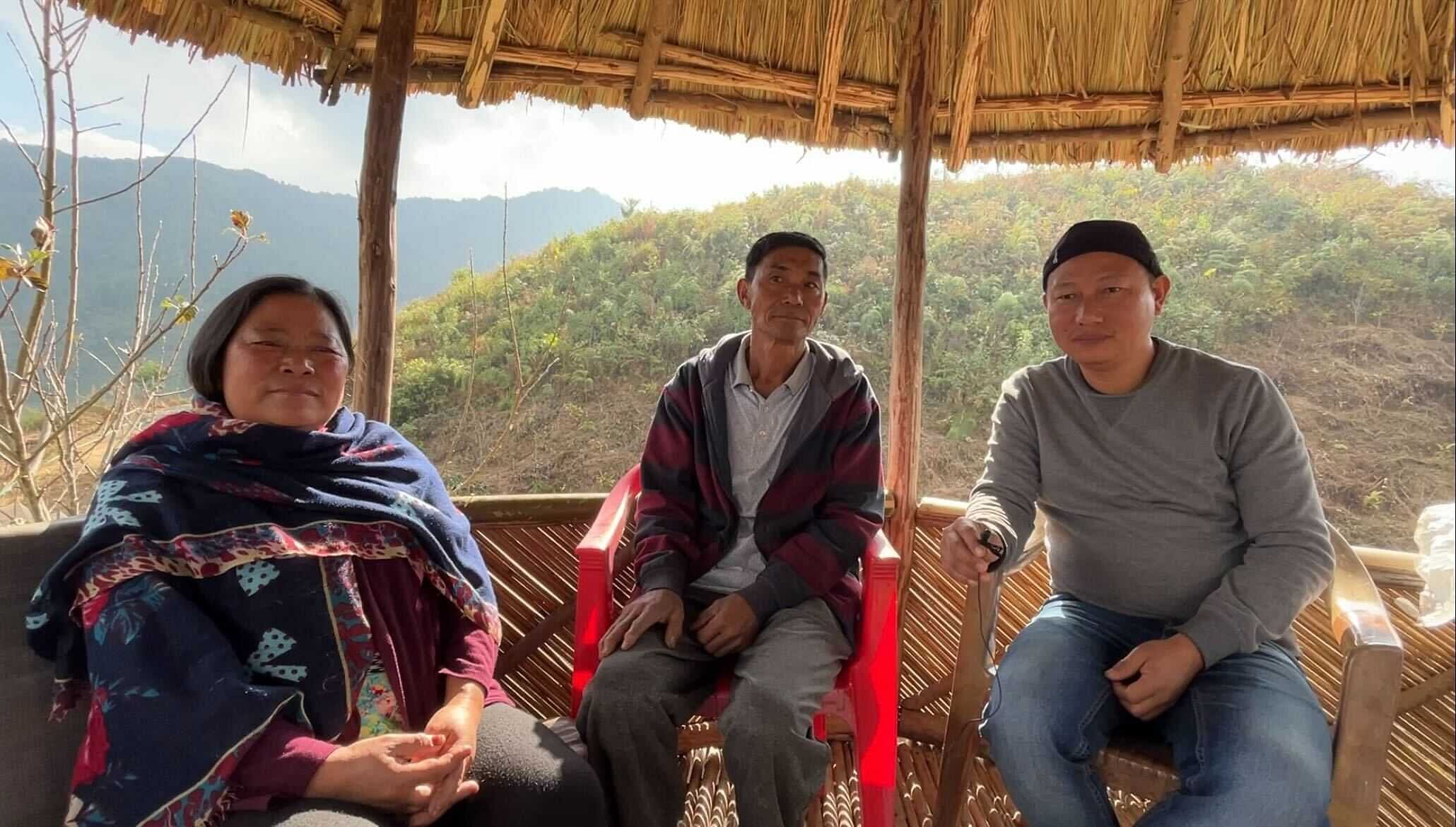 Better Life Foundation founder Sethrichem Sangtam (Right) with a couple whose income have shot up after adopting innovative farming techniques, in Angangba village in Eastern Nagaland | Photo: Disha Verma | ThePrint