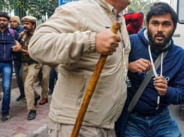 Delhi Police personnel detain students after SFI's announcement to screen the BBC documentary on PM Modi at the Jamia Millia Islamia campus in New Delhi, on 25 January 2023 | PTI