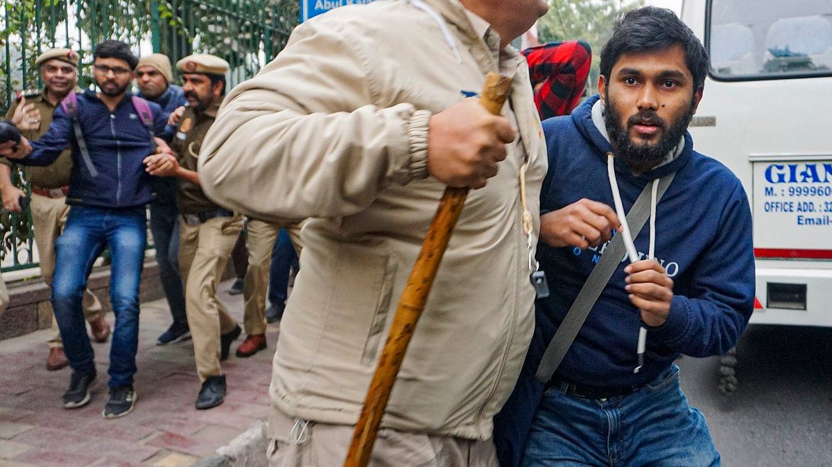 Delhi Police personnel detain students after SFI's announcement to screen the BBC documentary on PM Modi at the Jamia Millia Islamia campus in New Delhi, on 25 January 2023 | PTI