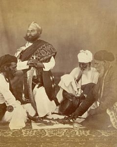 Rajput Men Playing the Game of Puchesee, Eugene Clutterbuck Impey, c. 1860, Photographic print. Image courtesy of Britsh Library