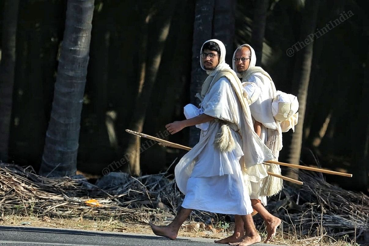Sadhu Bhagyaratna, 18, walking along with Sadhu Somyang Ratnavir, 40, who became a Jain monk 17 years ago | Praveen Jain | ThePrint