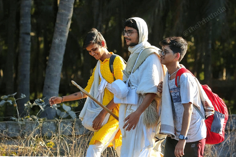 Sadhu Bhagyaratna Vijay (in the centre), 18, walks with two brothers, Reek 18 (Left) and Varsham Jain 16, who are undergoing training to become Jain monks, in Chodwar town | Praveen Jain | ThePrint