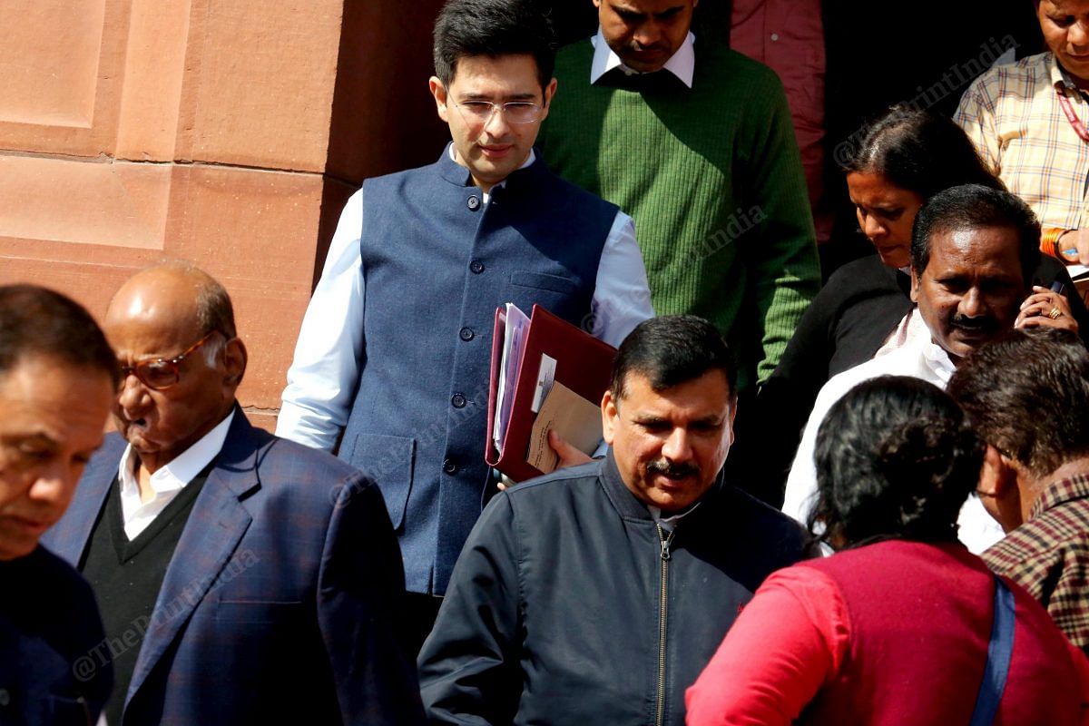 AAP MPs Raghav Chadha and Sanjay Singh outside Parliament | Praveen Jain | ThePrint