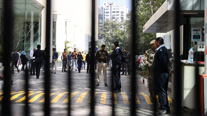 Police officers stand outside a building having BBC offices, where income tax officials are conducting a search, in New Delhi on 14 February 2023 | Photo: Reuters