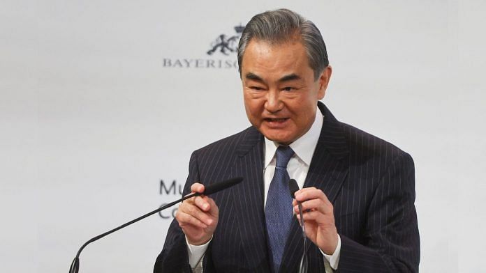 China's Director of the Office of the Central Foreign Affairs Commission Wang Yi speaks during the Munich Security Conference (MSC) in Munich, Germany 18 February 2023 | Reuters/Wolfgang Rattay