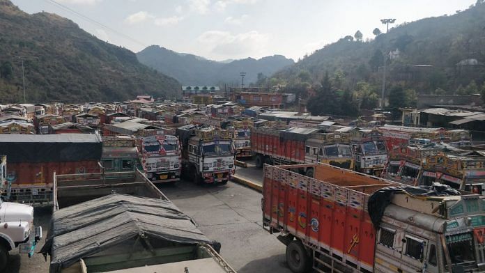 Trucks line up outside the Adani cement plant in Darlaghat, Himachal Pradesh | Photo: Krishan Murari | ThePrint