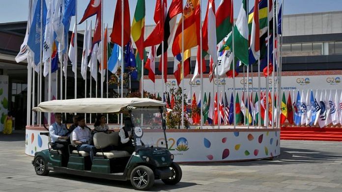 Delegates ride in a buggy at G20 finance officials meeting venue near Bengaluru on 22 February, 2023 | Reuters