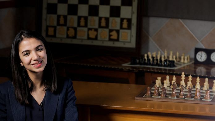 Iranian chess player Sarasadat Khademalsharieh, better known as Sara Khadem, smiles during an interview in southern Spain on 15 February 2023 | Photo: Reuters