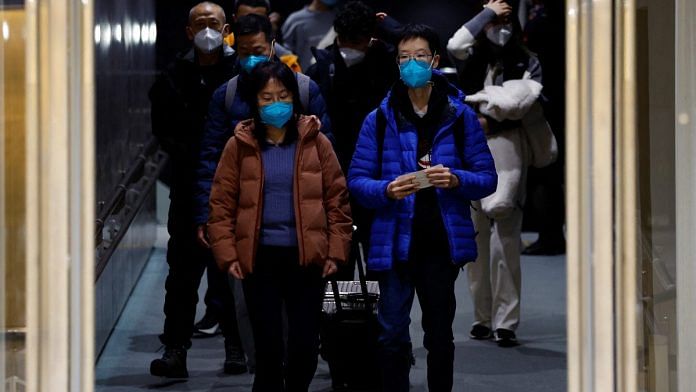 Passengers on a plane from China’s capital Beijing arrive at Narita international airport in Narita, east of Tokyo, Japan | Reuters file photo