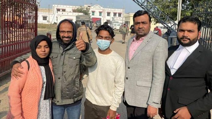 Journalist Siddique Kappan with his wife and teen son after his release from the Lucknow district jail | Twitter/@IAMCouncil