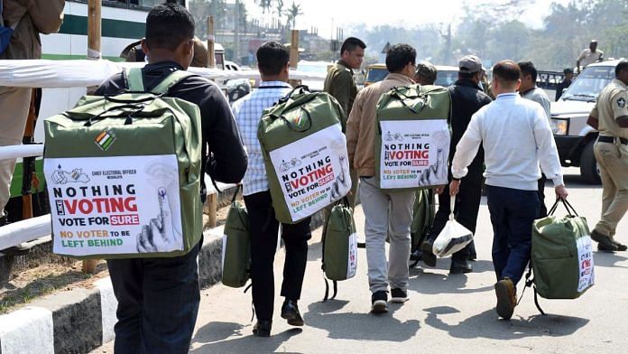 Polling officials with the EVMs and other polling materials head toward their respective polling stations on the eve of the Meghalaya Assembly elections, at Nongpoh, in Ri Bhoi | ANI photo