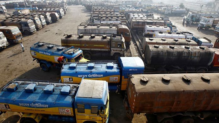 Oil tankers are seen parked at a yard outside a fuel depot on the outskirts of Kolkata on 3 February 2015 | Photo: Reuters File