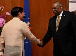 US Defense Secretary Lloyd Austin III shakes hands with Philippines President Ferdinand "Bongbong" Marcos Jr. at the Malacanang presidential palace in Manila, Philippines, February 2, 2023 | Reuters