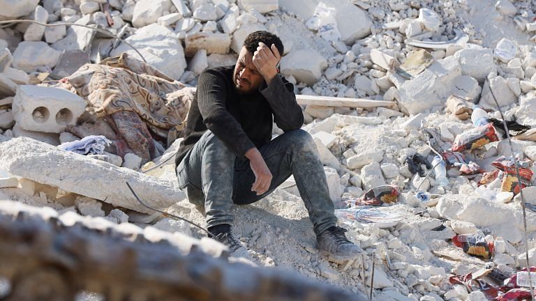 Tangled in politics of humanitarian aid, Syrians pick up pieces alone after quake in Idlib