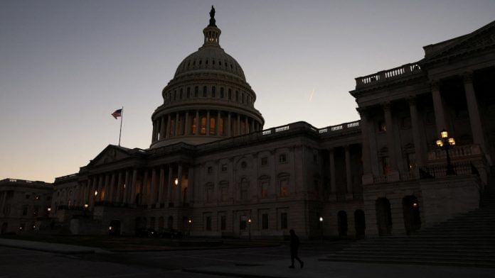 A person walks past the U.S. Capitol building in Washington | Reuters file photo