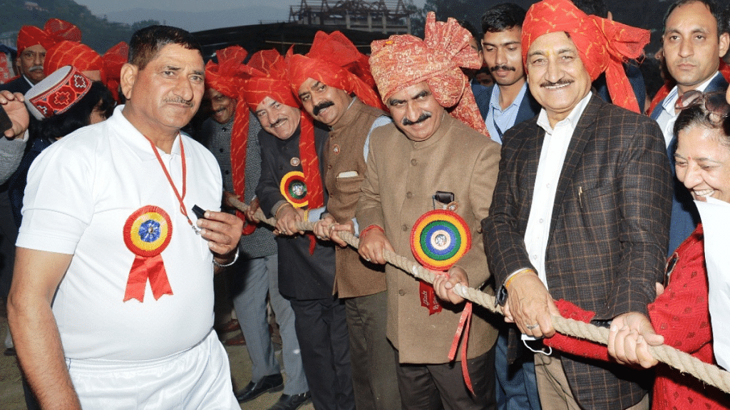 Himachal Pradesh CM Sukhvinder Singh Sukhu (wearing light colour turban) participates in a ritual at International Mandi Shivratri fair | Twitter | @CMOFFICEHP