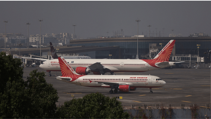 RAir India passenger aircraft are seen on the tarmac at Chhatrapati Shivaji International airport in Mumbai, India, February 14, 2023. Reuters/Francis Mascarenhas