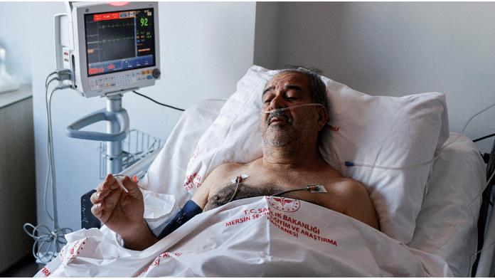 Huseyin Berber, 62, speaks to media and doctors as he receives medical attention at Mersin City hospital, in the aftermath of a deadly earthquake, in Turkey, 15 February, 2023. Reuters/Maxim Shemetov