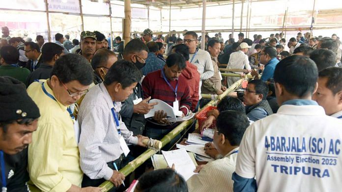 Polling officials prior to collecting the Electronic Voting Machine (EVMs) and other necessary inputs required for the Tripura Assembly Election 2023, in Agartala on Wednesday | ANI