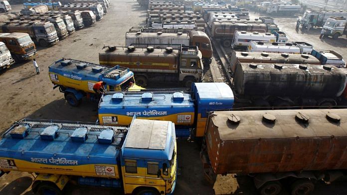 File photo of oil tankers seen parked at a yard outside a fuel depot on the outskirts of Kolkata 3 February, 2015 | Reuters