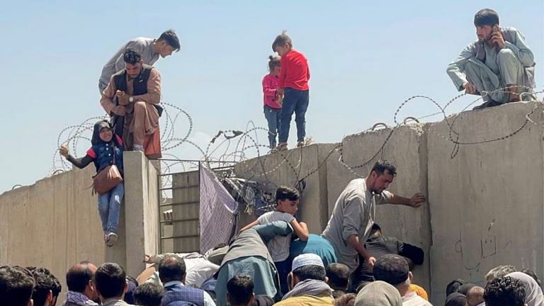 Knee deep sewage, sea of documents—the story of two families escaping the war in Kabul
