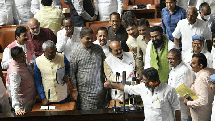 Karnataka CM Basavaraj Bommai and BJP MLAs watch Congress leader D. K. Shivakumar inside Karnataka Assembly in Bengaluru on Friday | Twitter | @BJP4Karnataka