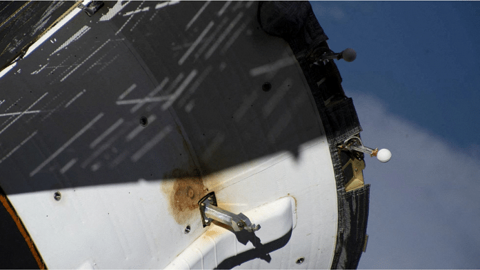 A view shows external damage believed to have caused a loss of pressure in the cooling system of the Soyuz MS-22 spacecraft docked to the International Space Station (ISS), in this image released 13 February, 2023. Roscosmos/Handout via Reuters