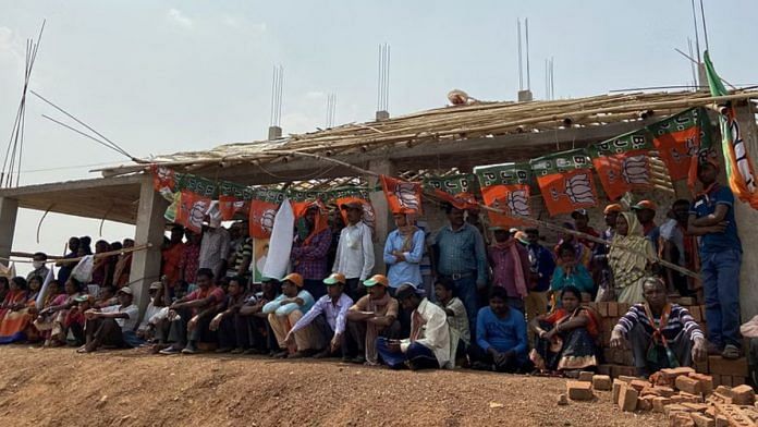 BJP supporters wait for Union Minister Arjun Munda’s election rally at Belpahari in Jangalmahal | Photo: Madhuparna Das/ThePrint