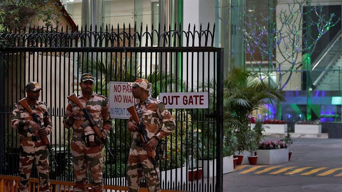 File photo of members of the Indo-Tibetan Border Police (ITBP) standing guard outside a building housing BBC offices, where income tax officials were conducting a search in New Delhi, India, on 15 February, 2023 | Reuters