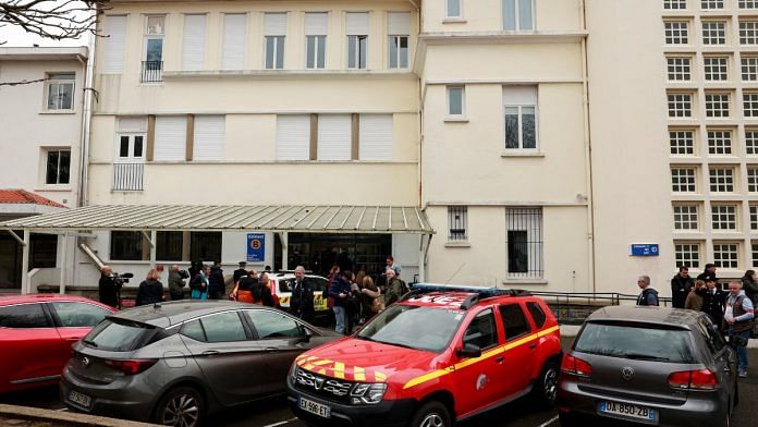 Police secure the entrance to the Saint-Thomas d'Aquin high school where a teacher was stabbed to death by a pupil in Saint-Jean-de-Luz, France, on Wednesday | Reuters