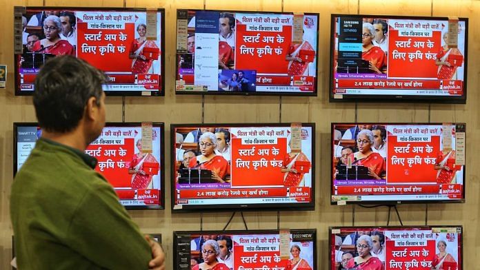 People watch as Finance Minister Nirmala Sitharaman presents Budget 2023 in parliament. ThePrint photo by Suraj Singh Bisht