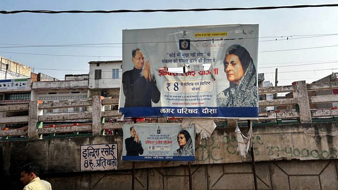 Posters and graffiti in Jaipur promoting the Indira Rasoi scheme, which provides meals at a subsidised rate of Rs 8 | Credit: Jyoti Yadav | ThePrint