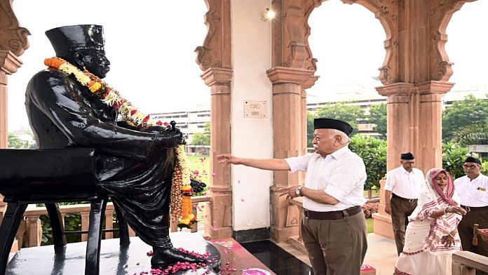 File photo of RSS chief Mohan Bhagwat paying floral tribute to the statue of Sangh founder K.B. Hedgewar | ANI