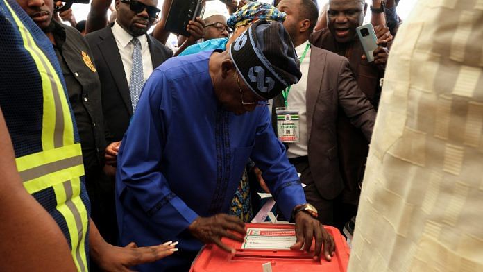 Presidential candidate Bola Ahmed Tinubu casts his ballot at a polling station, in Ikeja, Lagos, Nigeria on 25 February, 2023 | Reuters