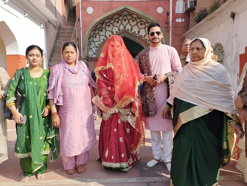 Muslim couple who got married in Delhi's Fatehpuri mosque with their family | Photo: Heena Fatima | ThePrint