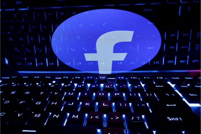 File photo of a keyboard placed in front of a displayed Facebook logo in this illustration taken 21 February, 2023 | Reuters