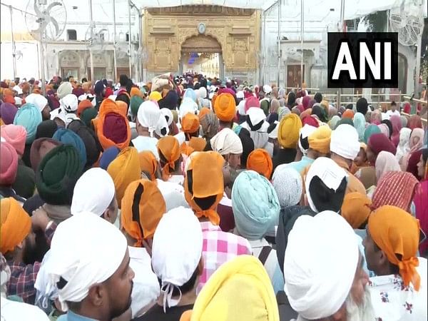 Devotees celebrate Hola Mohalla at Golden Temple in Amritsar